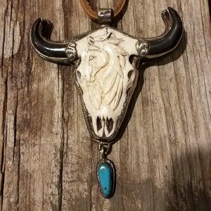 Engraved bone with turq.